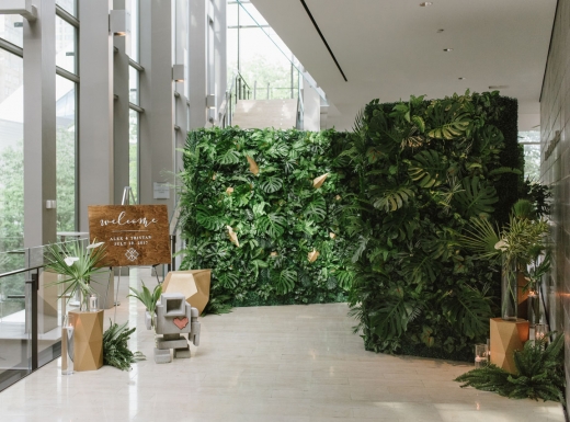 wedding floral arrangement green wall reception (1)